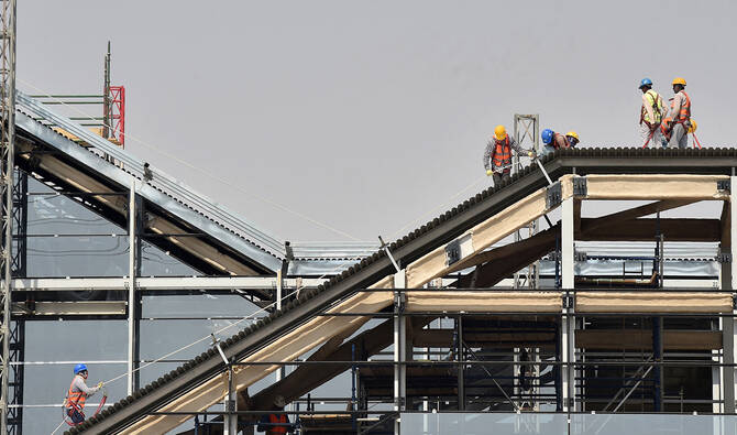 A picture taken on October 18, 2018 shows a general view of foreign labourers working in the construction site of Riyadh's metro. (AFP/ file)