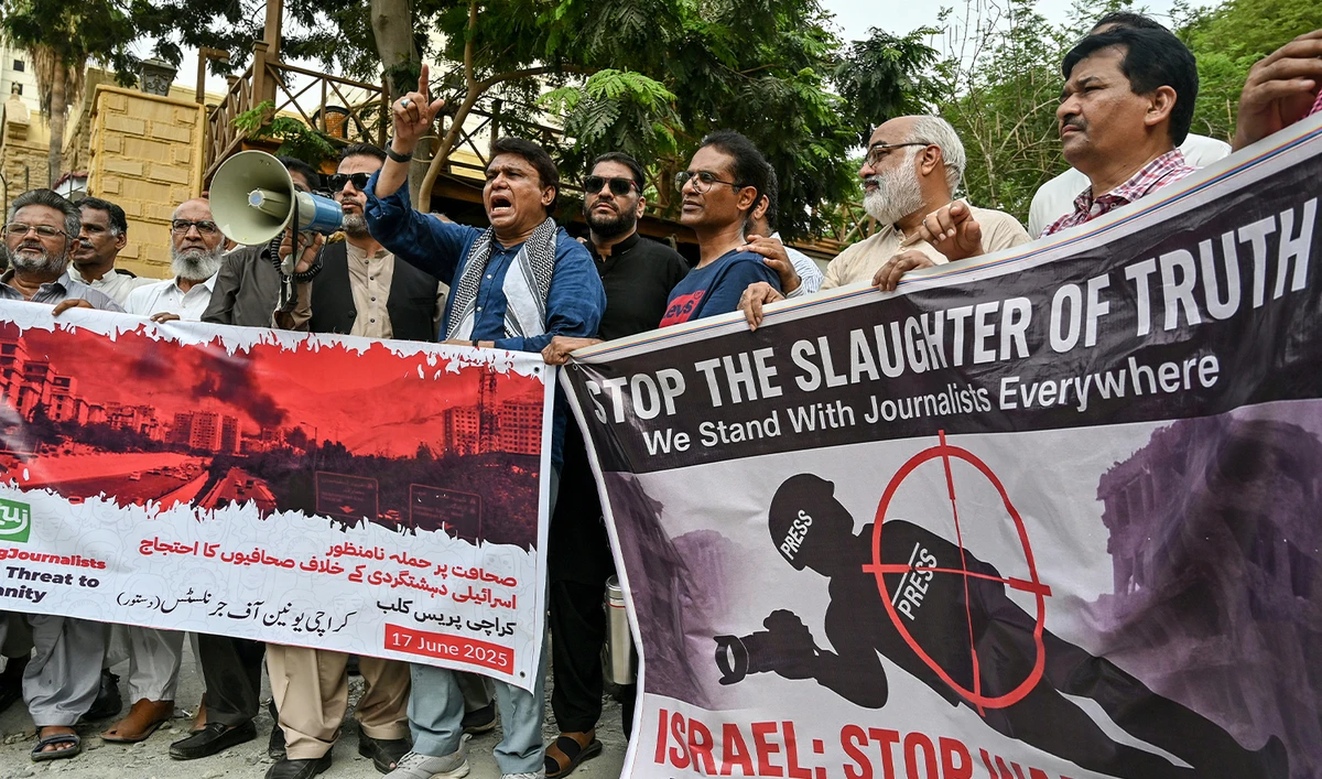 Pakistan's journalists carrying banners shout slogans during a march in Karachi on June 17, 2025. (AFP/File)