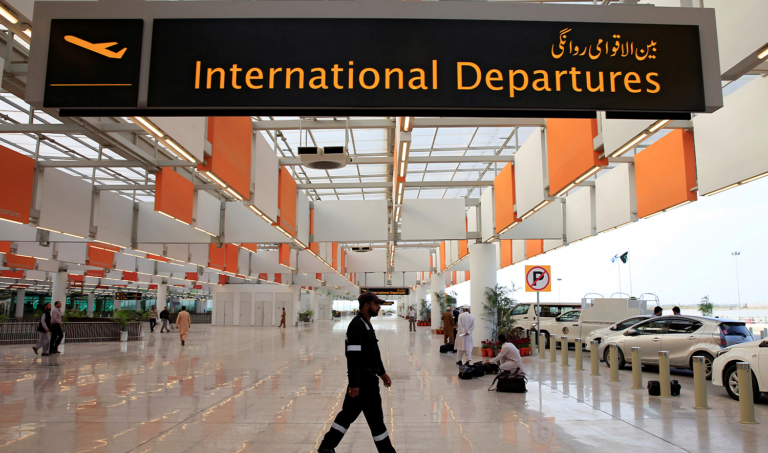 A worker walks at the departure area of Islamabad International Airport in Islamabad on April 18, 2018. (REUTERS/File)
