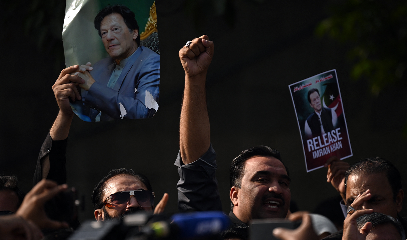 Pakistan Tehreek-e-Insaf (PTI) party supporters protest to demand the release of their jailed leader and Pakistan’s former Prime Minister Imran Khan, in Islamabad on December 2, 2025. (AFP/File)