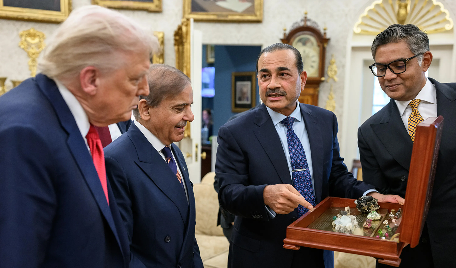 Pakistan's Army Chief Field Marshal Asim Munir (second from right) presents mineral samples to US President Donald Trump (left) at The White House in Washington DC, US, on September 26, 2025. (The White House/File)