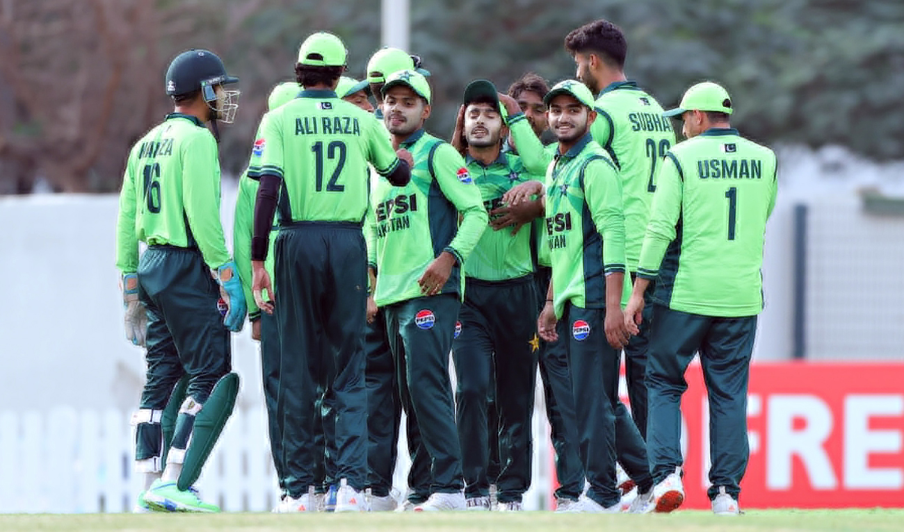 Pakistan’s Under-19 cricket team players celebrate after taking a wicket during an Asia Cup match against UAE in Dubai on December 16, 2025. (PCB/File)