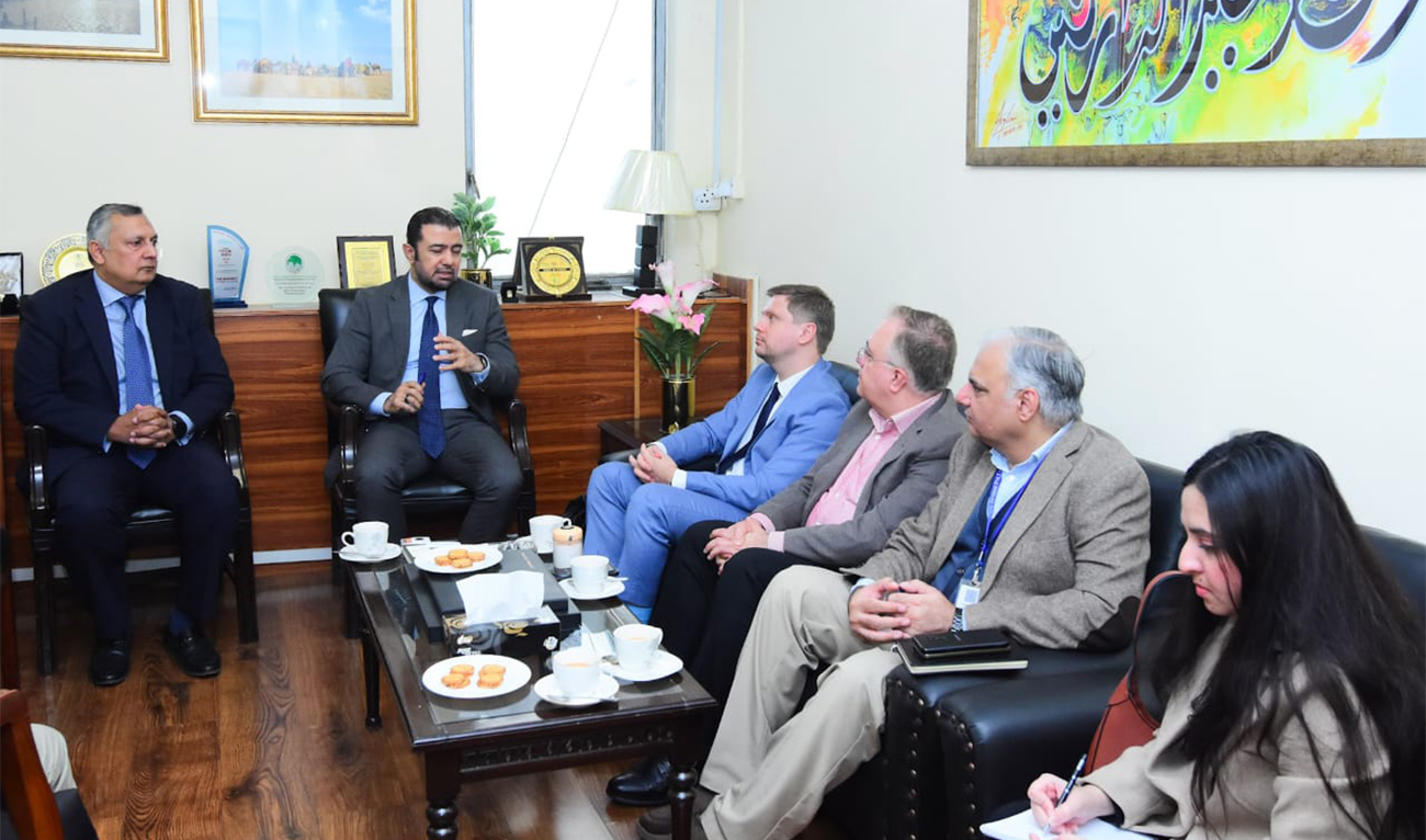 Advisor to Finance Minister, Khurram Schehzad meeting with a high-level delegation of leading international fintech investors from the Middle East led by Dr. John Sfakianakis, Chairman Fintech Solutions Holding, in Islamabad on December 20, 2025. (Finance ministry)