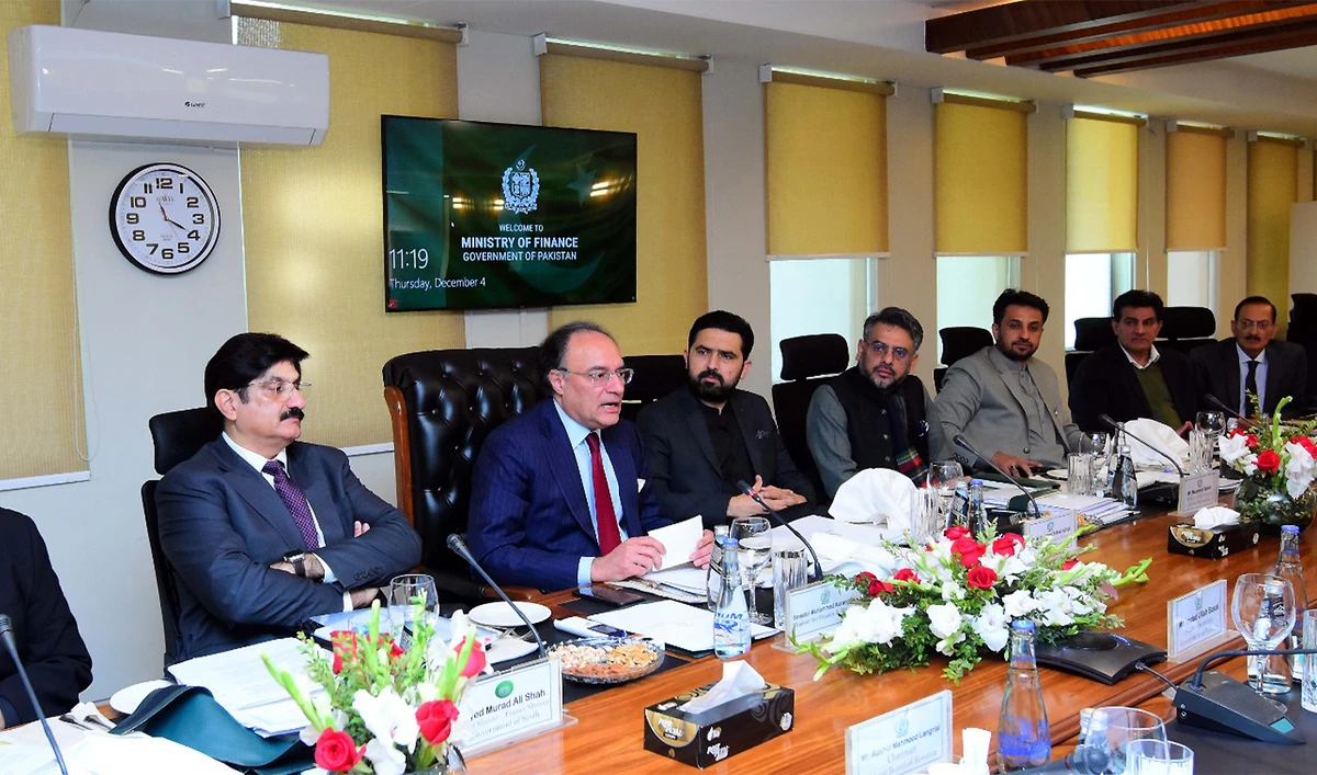 Pakistan Finance Minister Muhammad Aurangzeb (center) addresses the National Finance Commission in Islamabad, Pakistan, on December 4, 2025. (Finance Ministry)