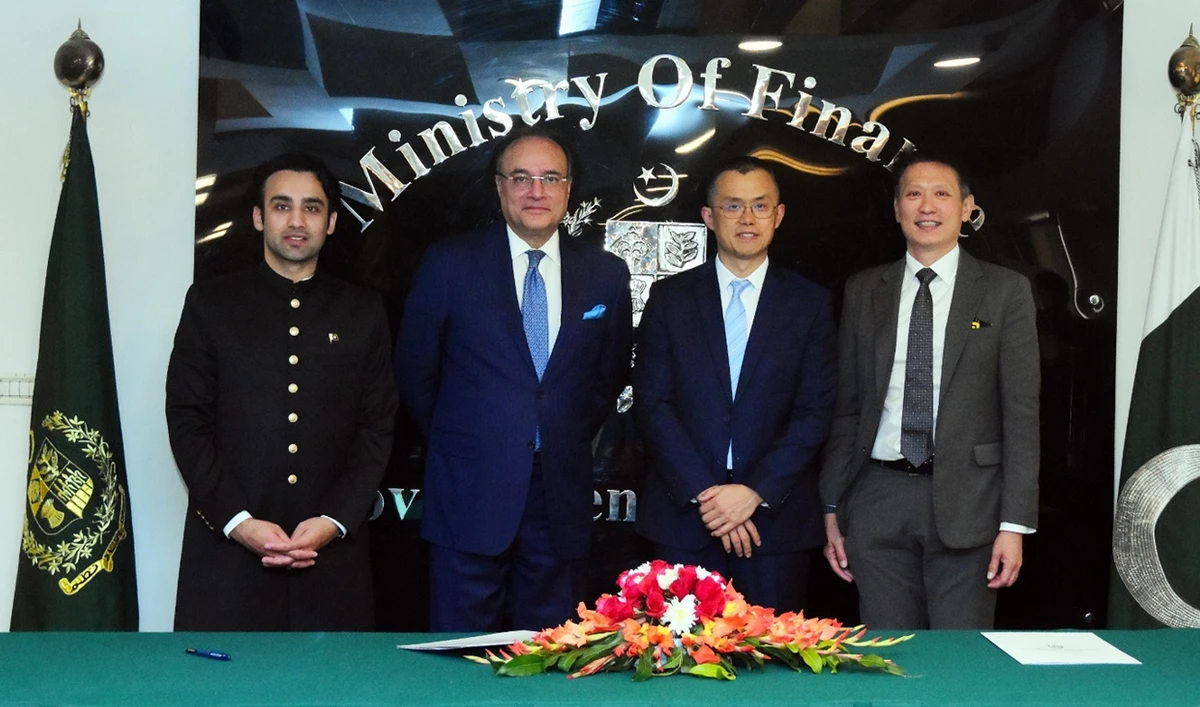(Left to right) Chairman of Pakistan Virtual Assets Regulatory Authority (PVARA) Bilal Bin Saqib, Pakistan’s Finance Minister Muhammad Aurangzeb, Binance CEO Changpeng Zhao and Binance Co-CEO Richard Teng pose for a group photo after signing a Memorandum of Understanding (MoU) at the Finance Division in Islamabad, Pakistan, on December 12, 2025. (Finance Ministry)