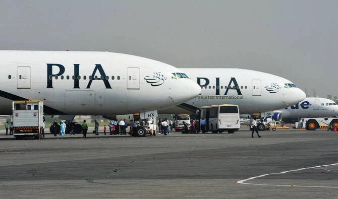 Pakistan International Airline (PIA) planes are positioned on the tarmac at the Benazir Bhutto International Airport in Islamabad on October 10, 2012. (AFP/ file)
