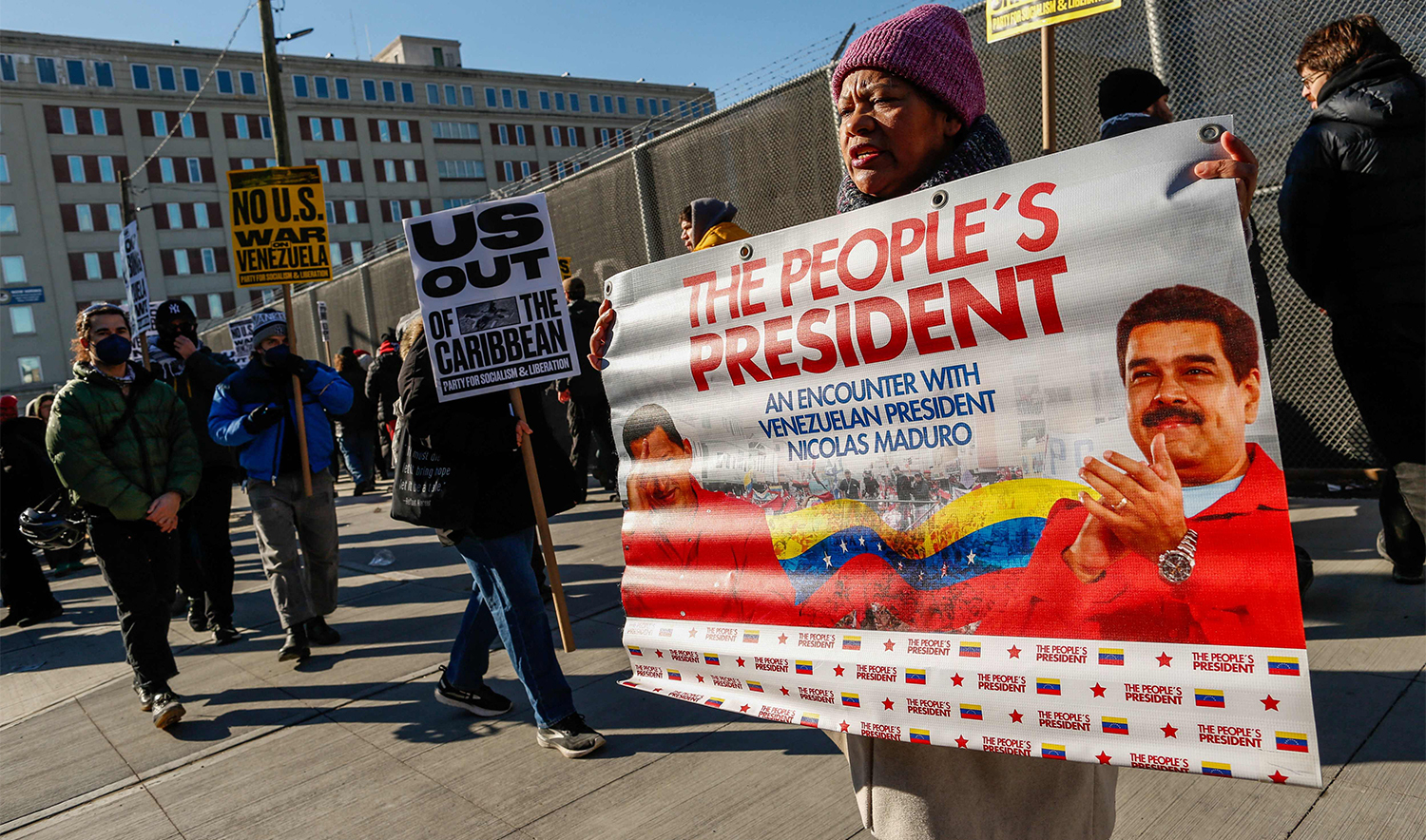 People take part in a demonstration against US military action in Venezuela outside the Metropolitan Detention Center, where ousted Venezuelan President Nicolas Maduro is being held, in the Brooklyn borough of New York City, on January 4, 2026. (AFP)