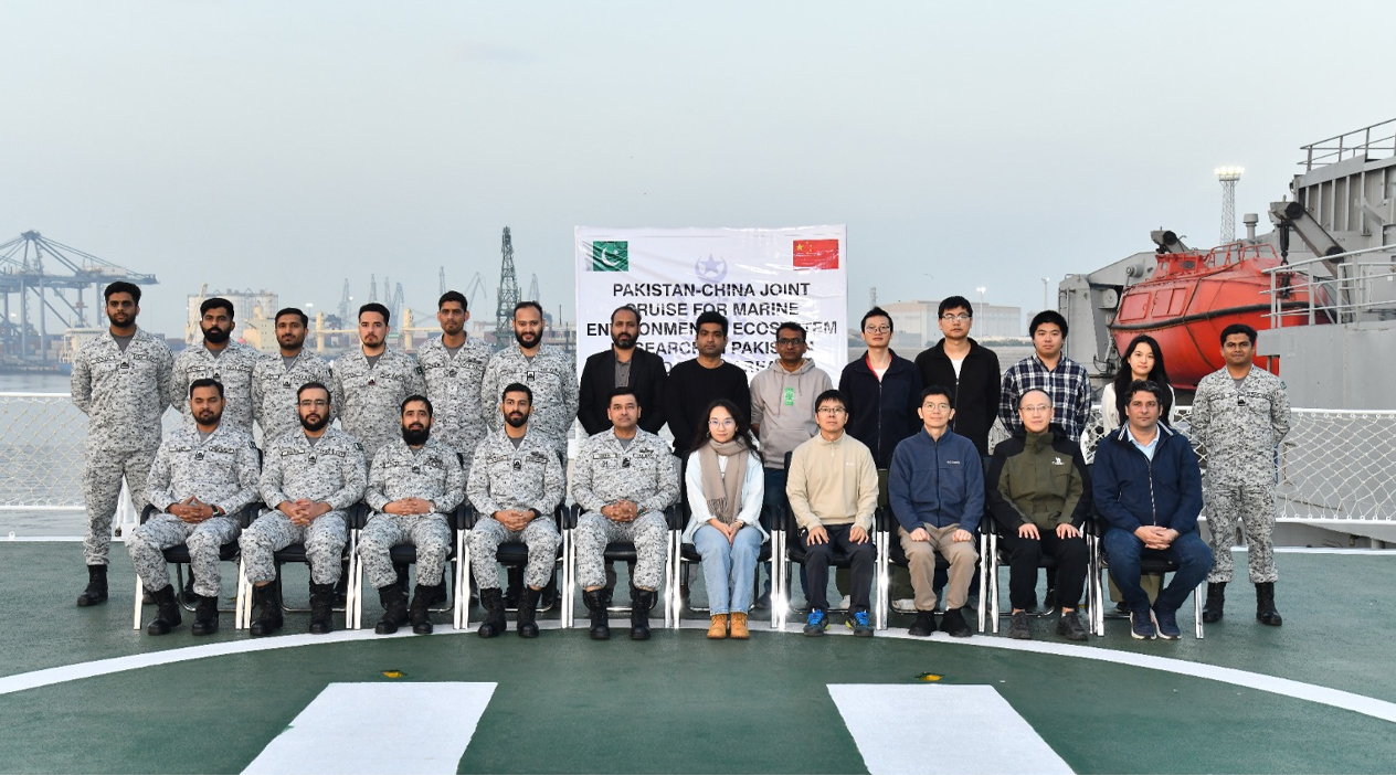 The handout photograph released on January 6, 2026, shows a group of researchers from China’s Second Institute of Oceanography, Pakistan’s National Institute of Oceanography (NIO), and Pakistan Navy officials posing for a group photo. (Courtesy: Pakistan Navy)