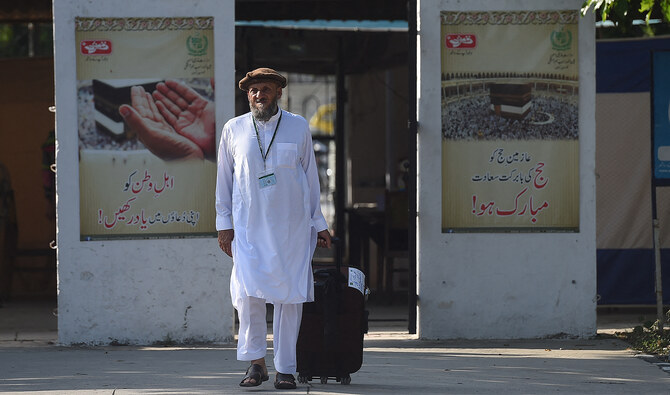 A Pakistani Hajj pilgrim arrives at The Hajj Complex in Islamabad on August 23, 2016, before leaving for the annual Hajj pilgrimage to the Islamic holy cities of Makkah and Madinah in Saudi Arabia. (AFP/File)