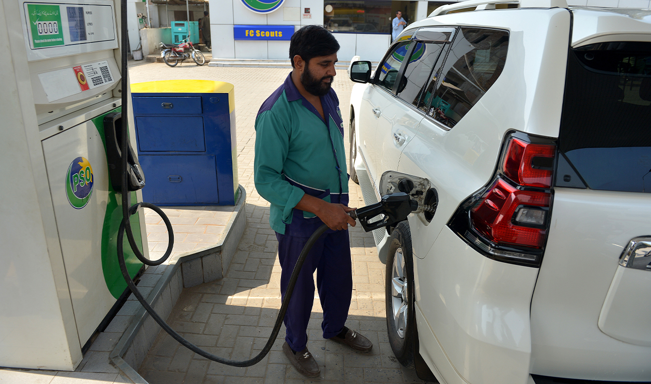 A petrol station worker fills the tank of a customer’s vehicle in Peshawar, Pakistan, on November 1, 2025. (EPA/File)