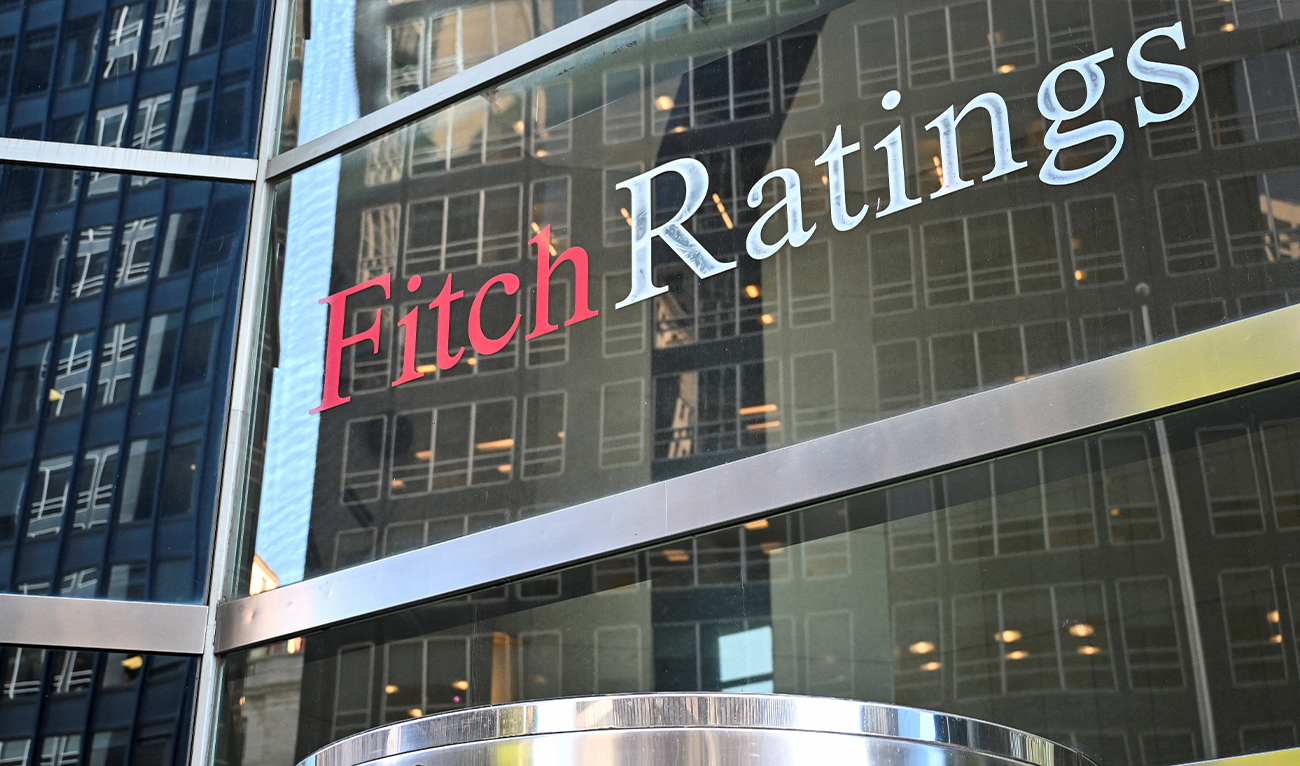The Fitch Ratings Inc. logo is seen at its headquarters in New York's financial district on March 18, 2025. (AFP/File)