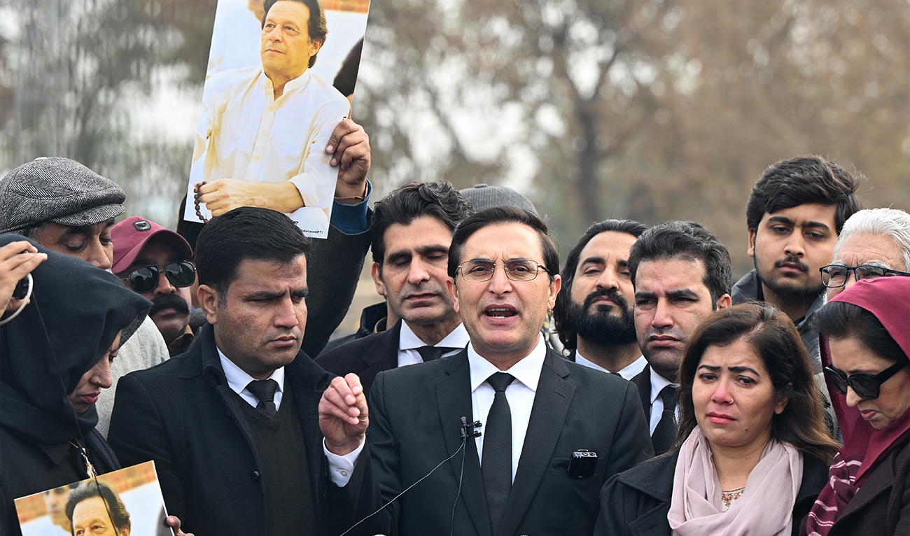 Former prime minister Imran Khan's Pakistan Tehreek-e-Insaaf (PTI) party's chairman and barrister Gohar Ali Khan (C) speaks to media outside the Adiala prison in Rawalpindi on January 17, 2025. (AFP/ file)