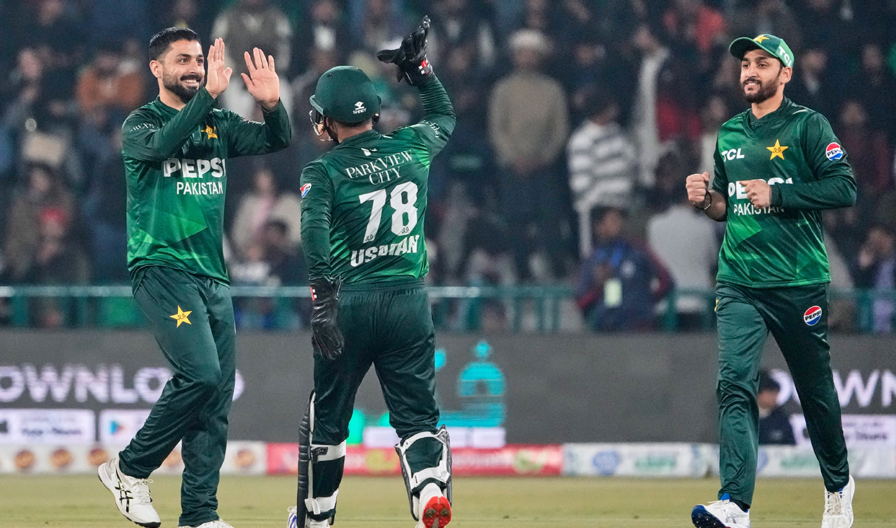 Pakistan's Abrar Ahmed, left, celebrates with teammates after the dismissal of Australia's Josh Philippe during the first T20 cricket match between Pakistan and Australia, in Lahore, Pakistan, Thursday, Jan. 29, 2026. (AP)