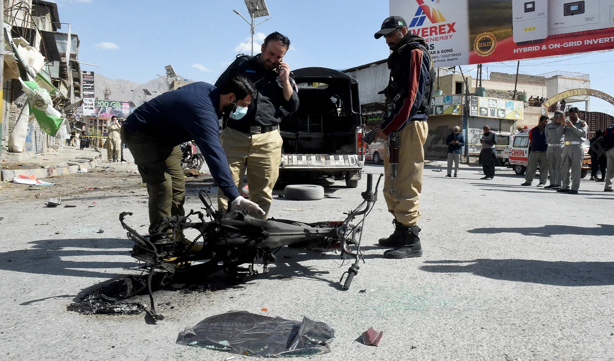 Security personnel inspect the site after militants detonated an explosive-laden motorbike along a road in Quetta on March 27, 2025. (AFP/File)