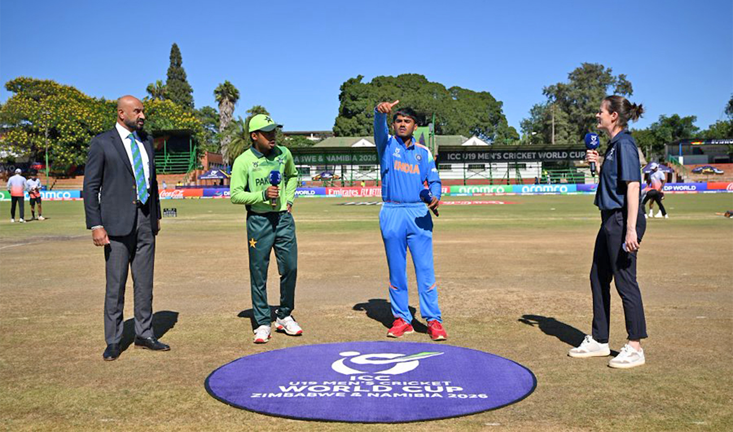Indian captain flips a coin as the Pakistani skipper looks on ahead of the ICC Under-19 Men’s Cricket World Cup match in Bulawayo on February 1, 2026. (Pakistan Cricket Board)