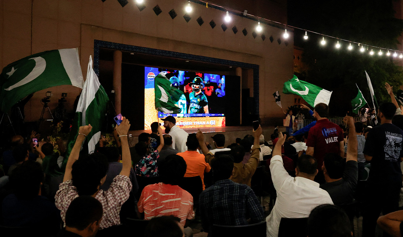 Pakistani fans watch the final cricket match of Asia Cup between India and Pakistan on a screen, in Karachi, Pakistan, September 28, 2025. (Reuters/File)