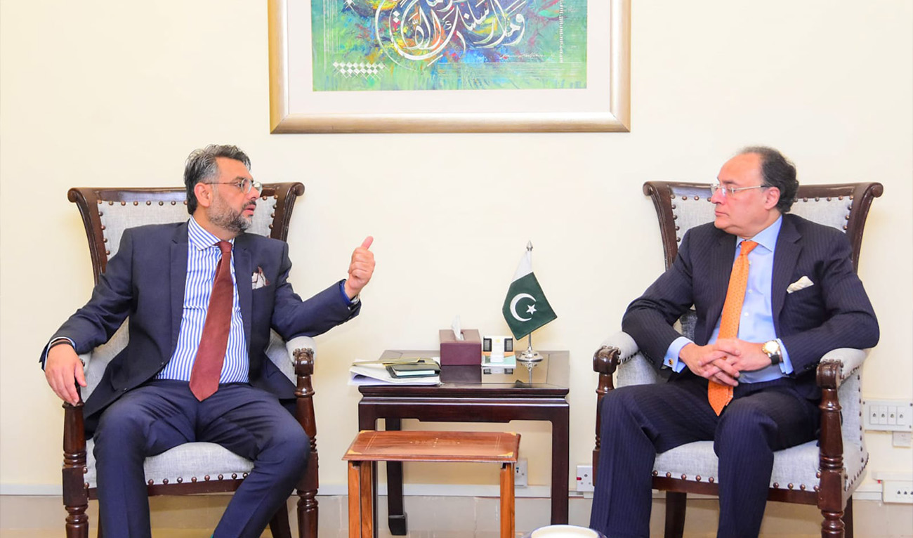 Federal Minister for Finance and Revenue Muhammad Aurangzeb meeting with Khyber Pakhtunkhwa (KP) Finance Adviser Muzamil Aslam in Islamabad on February 3, 2026. (Finance Ministry)