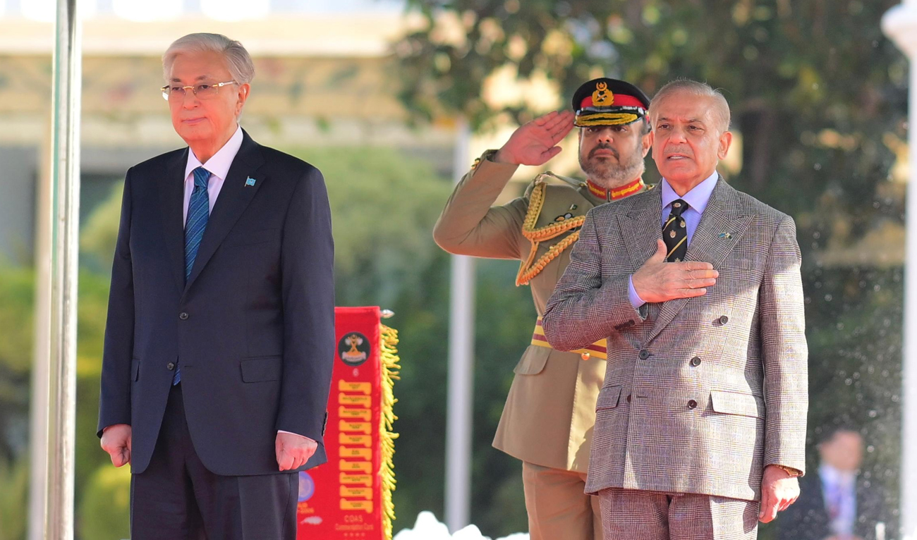 Prime Minister Shehbaz Sharif (Right) and President of Kazakhstan Kassym-Jomart Tokayev (Left) during the Guard of Honour Ceremony at the Prime Minister's House in Islamabad, Pakistan, on February 4, 2026. (GovofPakistan/X)