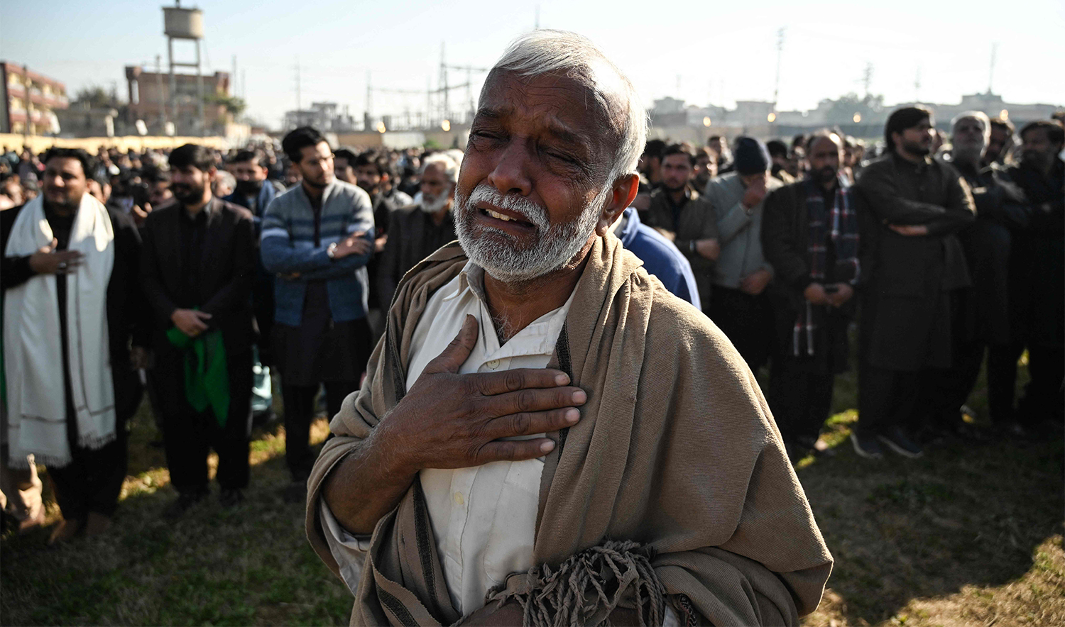 A mourner weeps during the funeral of Shiite Muslims, a day after a suicide bombing at a mosque in Islamabad on February 7, 2026. (AFP)