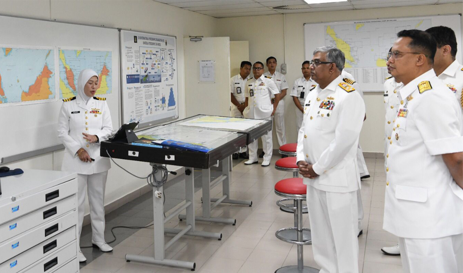 Pakistan Navy chief Admiral Naveed Ashraf (second from right) gets a briefing during his visit to Malaysia on February 8, 2026. (Pakistan Navy)