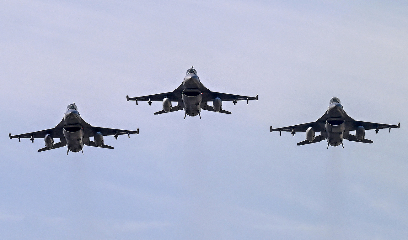 Pakistan Air Force F-16 fighter jets fly past over the President's House during the national day parade in Islamabad on March 23, 2025. (AFP/ file)