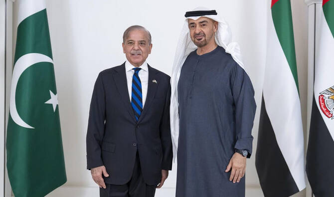 In this handout photo, released by the Pakistan Prime Minister’s Office, United Arab Emirates President Sheikh Mohamed bin Zayed Al Nahyan receives Pakistan Prime Minister Shehbaz Sharif (left) at the Qasr Al Shati in Abu Dhabi, UAE, on June 12, 2025. (PMO/File)