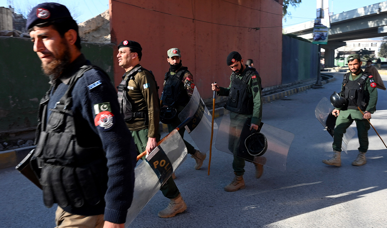 Police patrol along the street in Peshawar on February 9, 2024, a day after Pakistan's national elections. (AFP/ file)