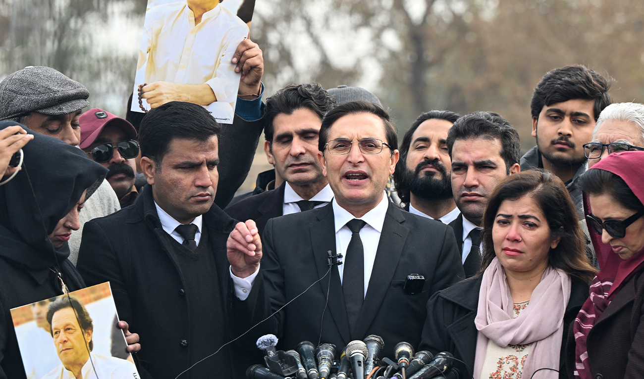 Former prime minister Imran Khan's Pakistan Tehreek-e-Insaaf (PTI) party's chairman and barrister Gohar Ali Khan (C) speaks to media outside the Adiala prison in Rawalpindi on January 17, 2025. (AFP/ file)