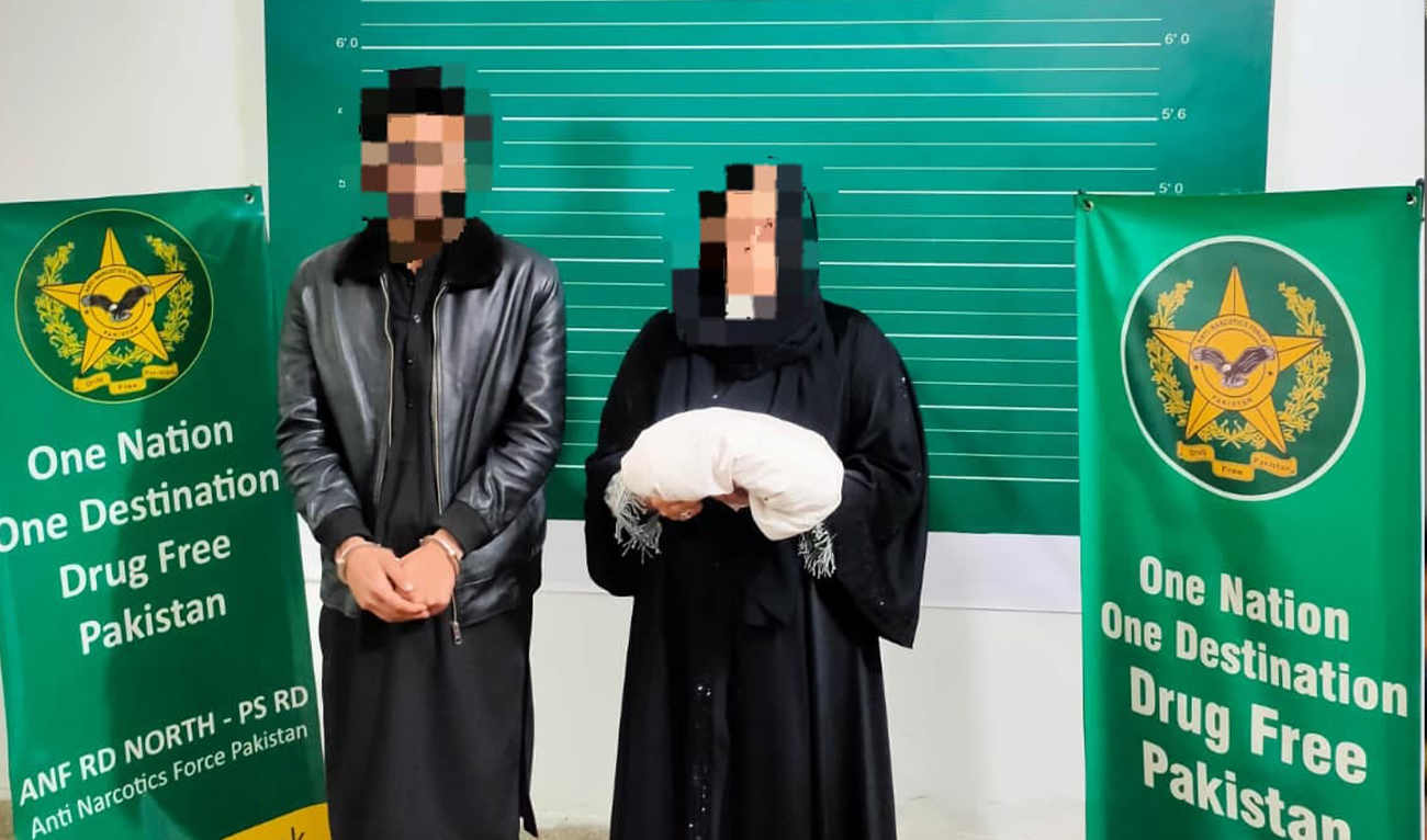 Two suspects arrested during a Pakistan–Qatar joint counter-narcotics operation at Islamabad Airport are shown in this handout image released by the Anti-Narcotics Force on February 17, 2026. (ANF)