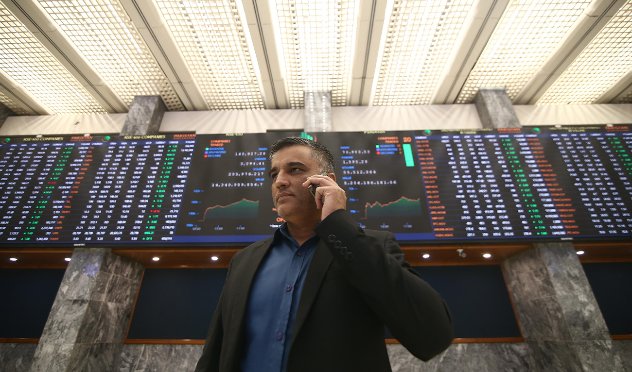 A trader monitors stock prices at the Pakistan Stock Exchange (PSX) in Karachi, Pakistan, on 31 October 2025. (EPA/File)