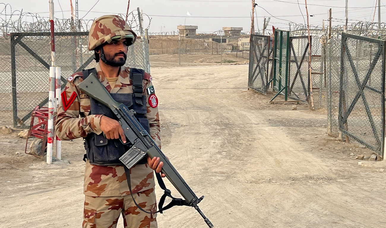 An army soldier stands guard at a deserted entry point at the Friendship Gate, following the exchanges of fire between Pakistan and Afghanistan forces, at the border crossing between the two countries, in Chaman, Pakistan, on February 27, 2026. (Reuters)