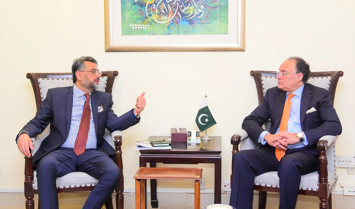 Federal Minister for Finance and Revenue Muhammad Aurangzeb meeting with Khyber Pakhtunkhwa (KP) Finance Adviser Muzamil Aslam in Islamabad on February 3, 2026. (Finance Ministry)