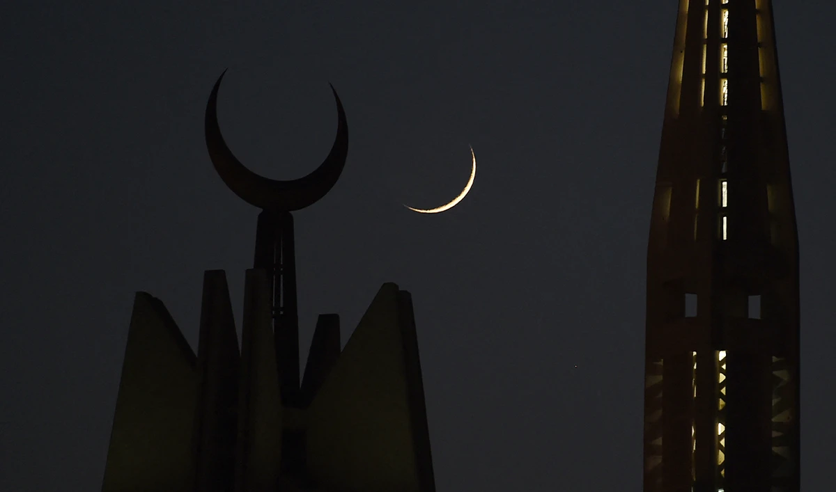 The first Ramadan moon rises over the giant Faisal Mosque in Islamabad on May 27, 2017. (AFP/File)