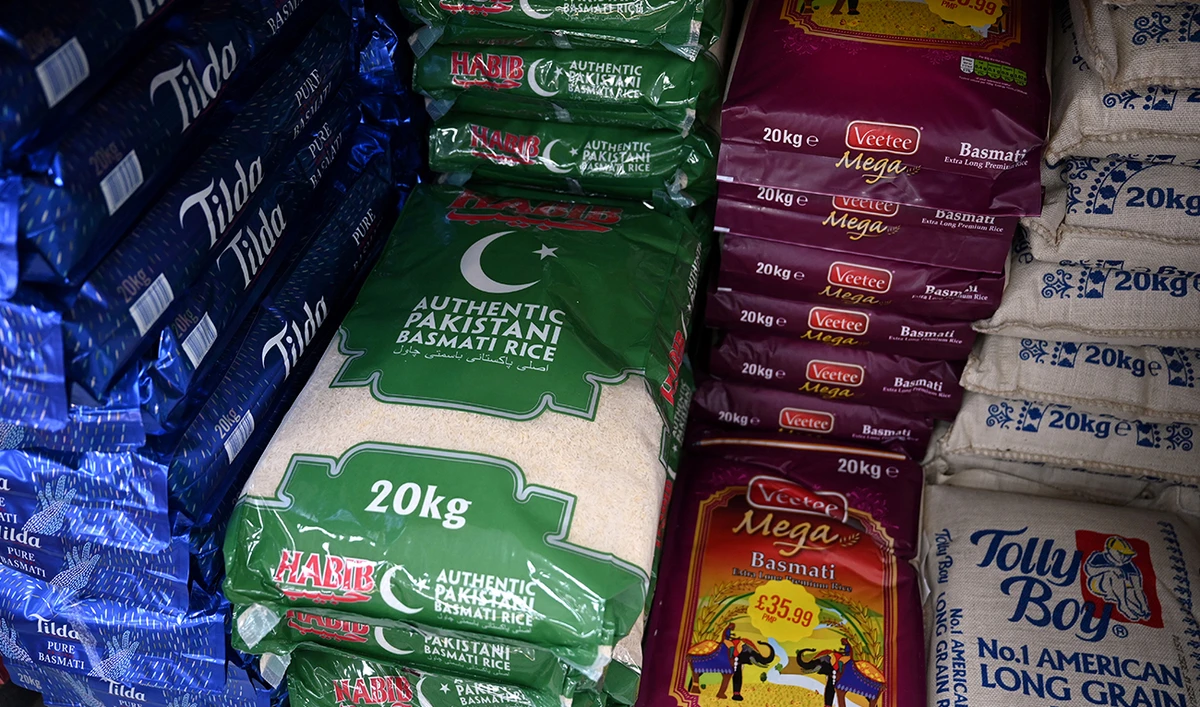A photograph taken on June 7, 2023 shows large bags of rice displayed for sale in Sonali Supermarket in the 'Balti Triangle' area of Birmingham, central England. (AFP/ file)