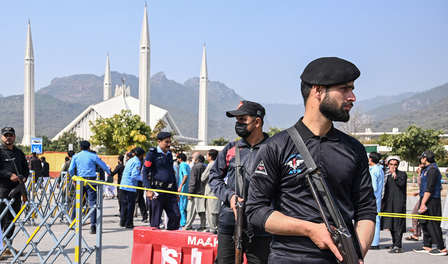 Security personnel stand guard outside the Faisal Mosque before the Friday prayers during the Islamic holy fasting month of Ramadan in Islamabad on February 27, 2026. (AFP)