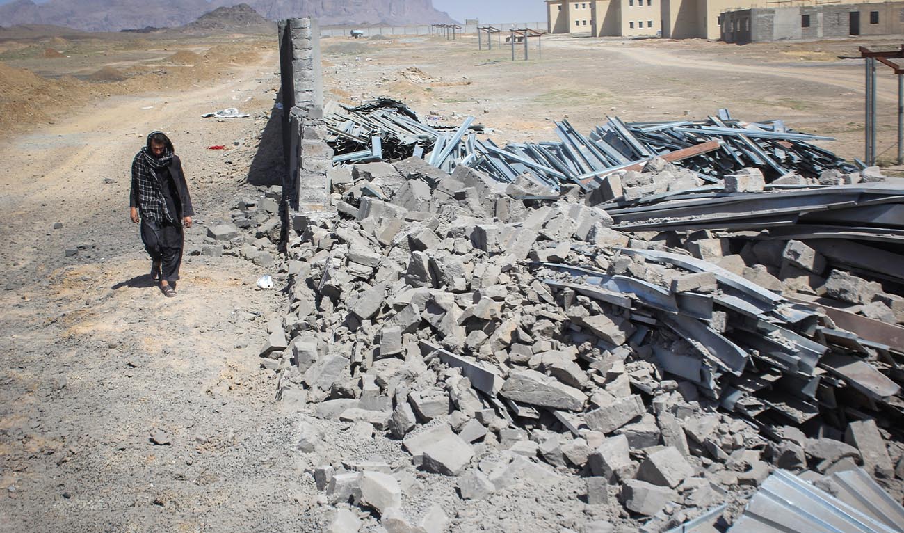 An Afghan man walks past a damaged wall following airstrikes, amid the conflict between Afghanistan and Pakistan, in Kandahar, Afghanistan, February 28, 2026. (REUTERS)