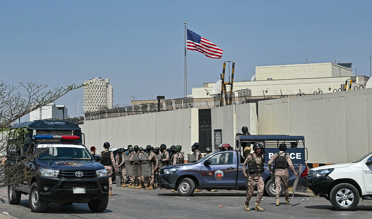 Security personnel stand guard outside the US consulate in Karachi on March 1, 2026 during a clash with Shiite Muslims as they attempt to storm the premises after the death of Iran's supreme leader Ayatollah Ali Khamenei amid US-Israel strikes.(AFP/File)