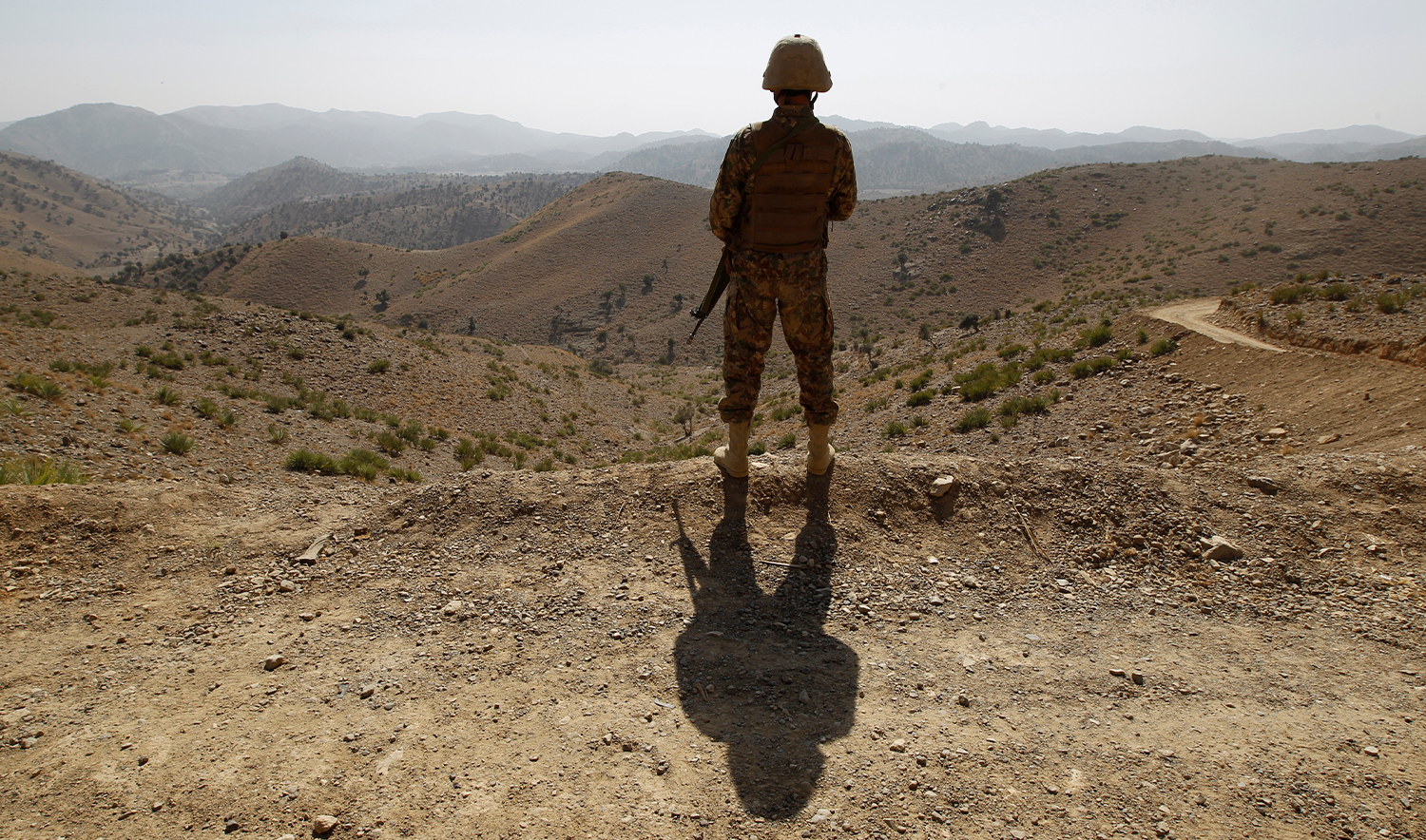 A soldier stands guard outside the Kitton outpost along the border fence on the border with Afghanistan in North Waziristan, Pakistan on October 18, 2017. (REUTERS/File)
