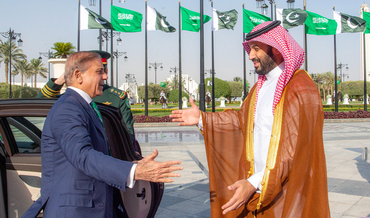 A handout picture provided by the Saudi Press Agency (SPA) on September 17, 2025, shows Saudi Arabia's Crown Prince Mohammed bin Salman (R) welcoming Pakistan's Prime Minister Shehbaz Sharif ahead of their meeting in Riyadh. (AFP/File)