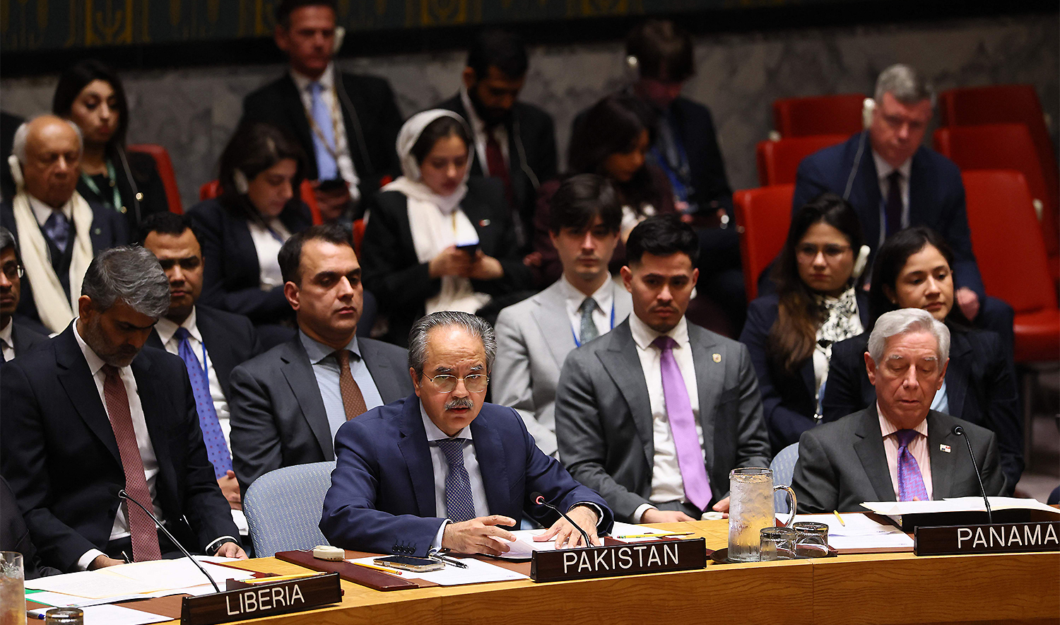 mbassador Asim Iftikhar Ahmad, Permanent Representative of Pakistan to the UN, speaks during a United Nations Security Council meeting on the situation in the Middle East at the United Nations headquarters in New York City. on March 11, 2026 (AFP)