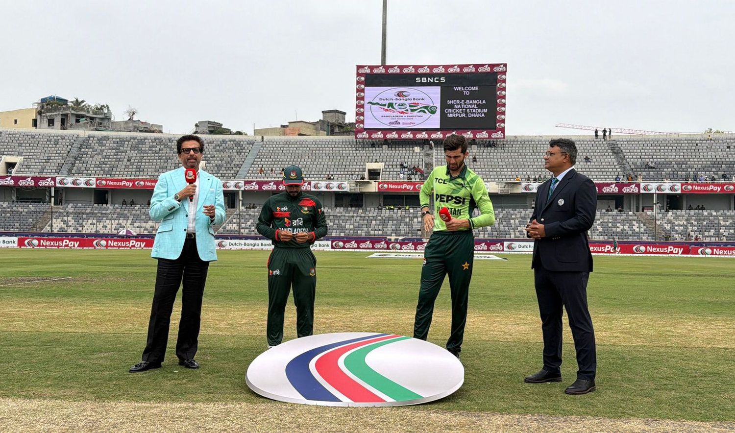 Pakistan and Bangladesh players engage in toss ahead of the third and final One Day International match of the series in Mirpur, Bangladesh, on March 15, 2026. (Pakistan Cricket Board)