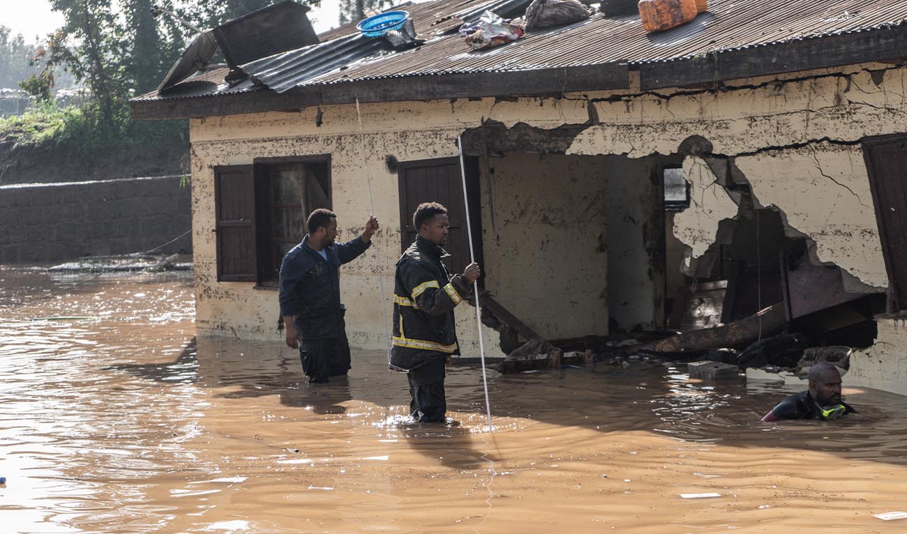 Fire fighters inspect damages caused by heavy rain which led to flood resident homes in Addis Ababa, Ethiopia, on August 18, 2021. (AFP/ file)