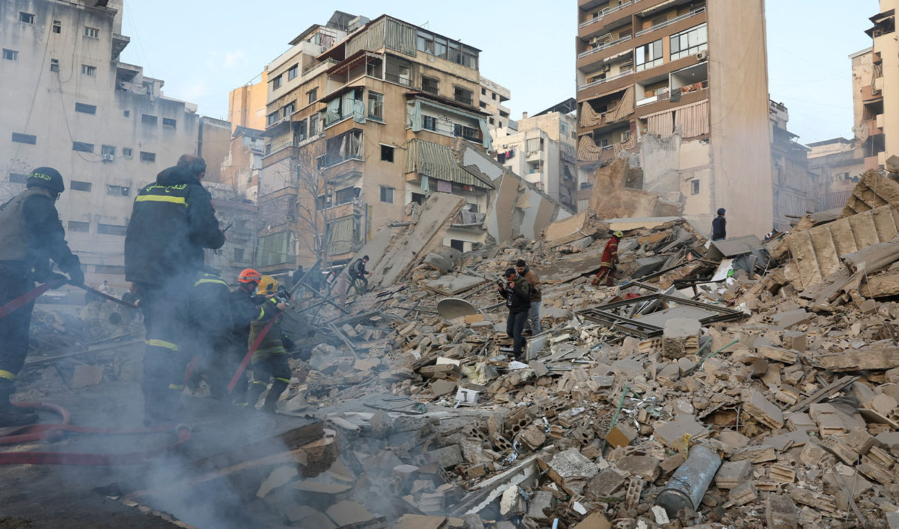 Emergency personnel work at the site of a collapsed building, in the aftermath of an Israeli strike in central Beirut's Bachoura neighbourhood, following an escalation between Hezbollah and Israel amid the U.S.-Israeli conflict with Iran, Lebanon, March 18, 2026. (Reuters/File)