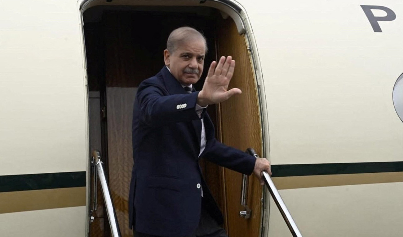 Pakistan's Prime Minister Shehbaz Sharif waves as he departs for the Shanghai Cooperation Organisation (SCO) Summit in Tianjin, China from Lahore, Pakistan, August 30, 2025. (Reuters/File)