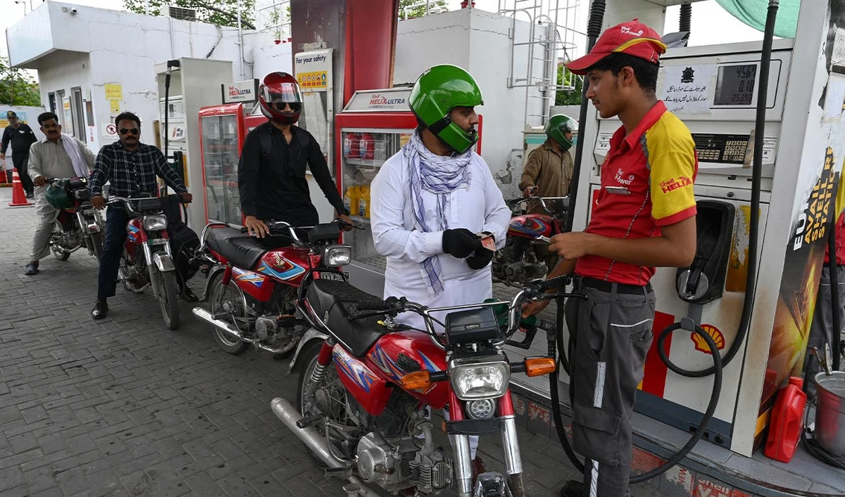 A worker pumps petrol in a motorbike at a fuel station in Rawalpindi on July 16, 2023. (AFP/ file)
