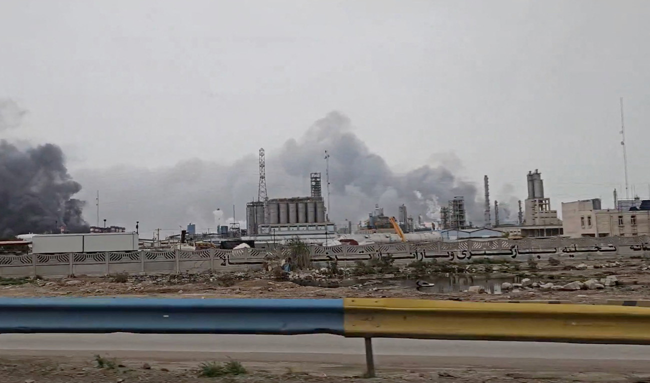 Smoke rises after strikes on the Mahshahr Petrochemical Zone in Bandar Mahshahr County, Khuzestan Province, Iran, in this handout picture released April 4, 2026, and obtained from a social media video. (Reuters)