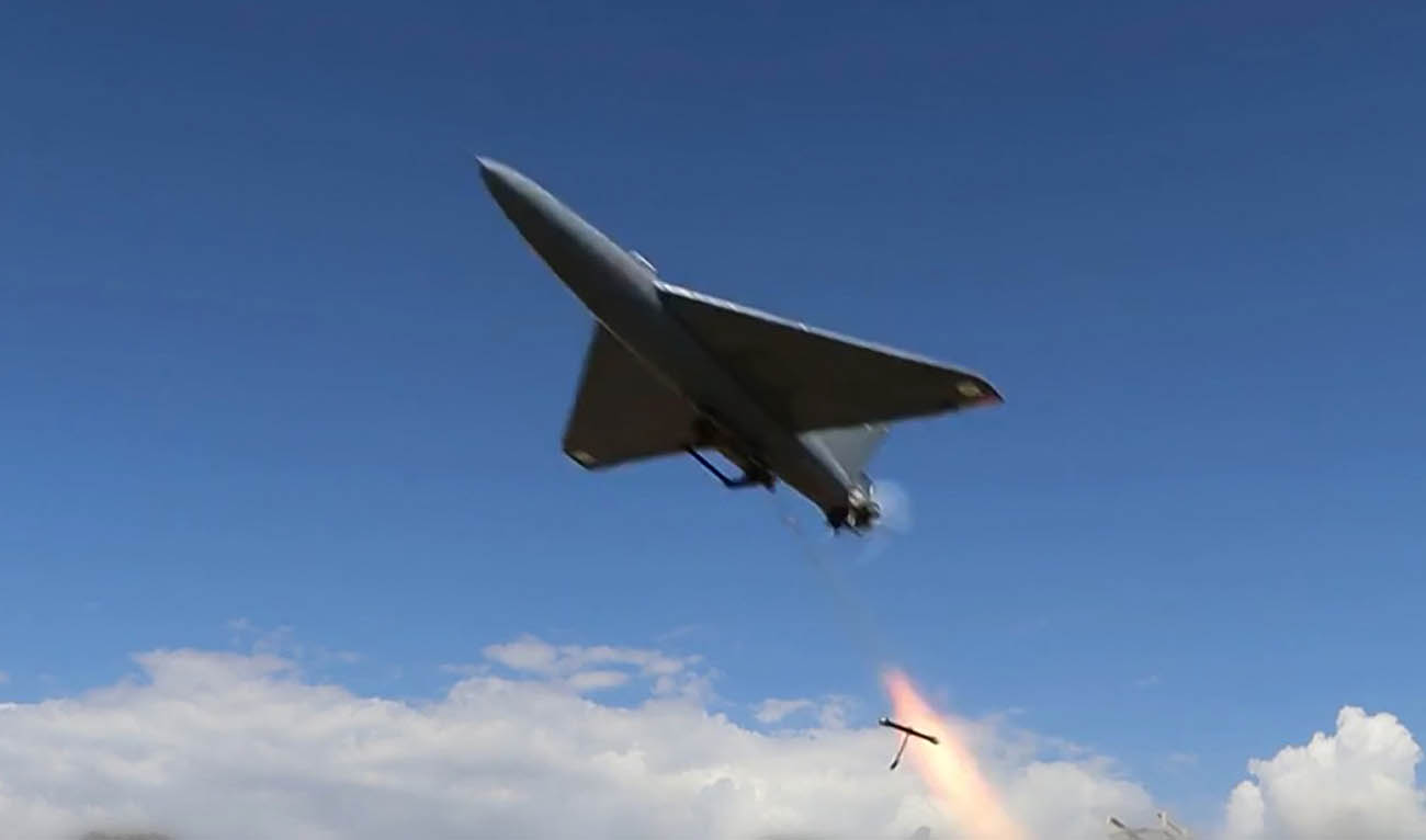 This grab taken from a video relesed by Iran's state broadcaster (IRIB) on April 6, 2026, show what it says are drones launched at US targets at Saudi Arabia's Al-Kharj base and Kuwait's Al-Adiri base. (AFP)