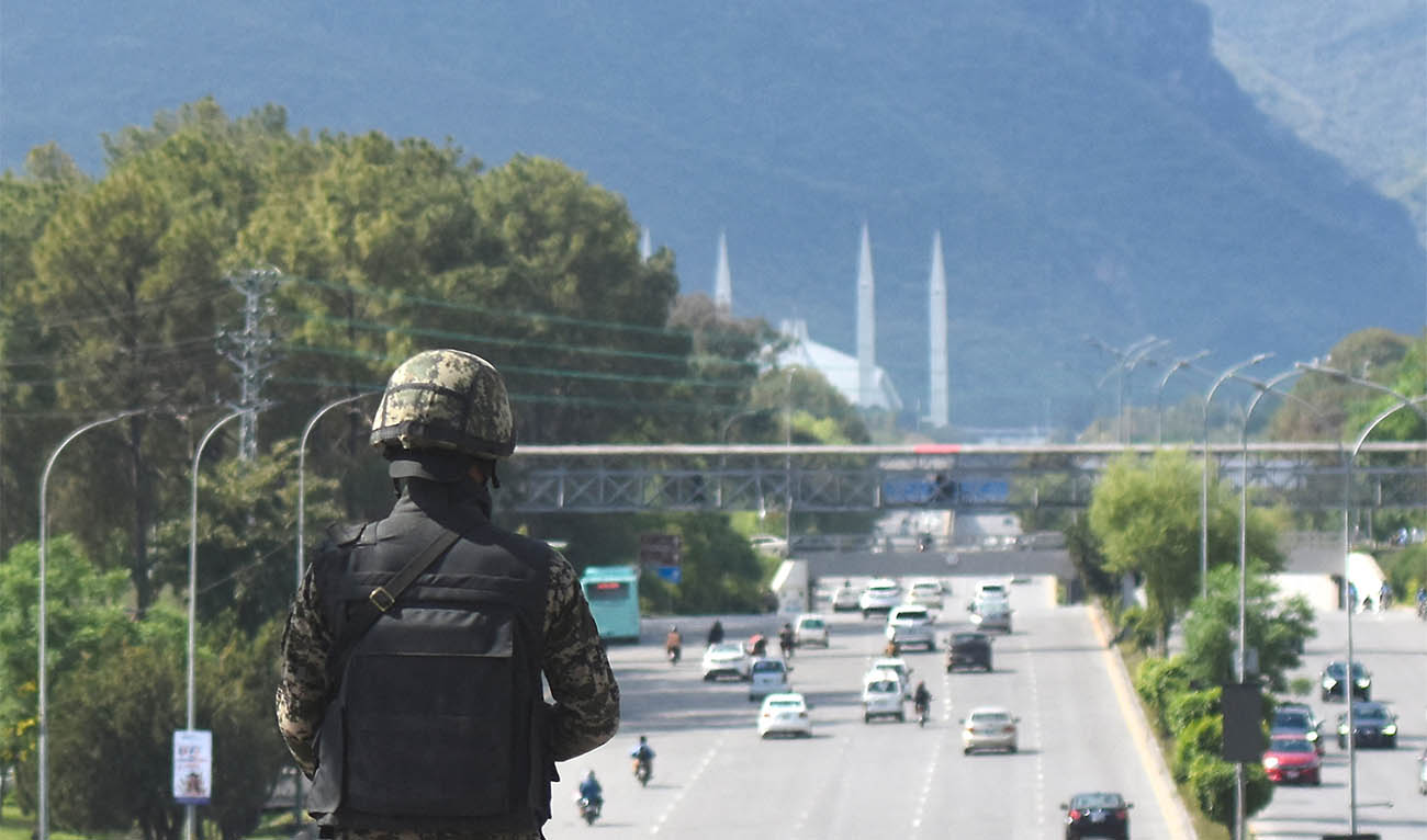 A security guard stands at Zero Point Bridge in a high security area as Pakistan gears up to host the U.S. and Iran for peace talks, in Islamabad, in Islamabad, Pakistan, April 9, 2026. (REUTERS)