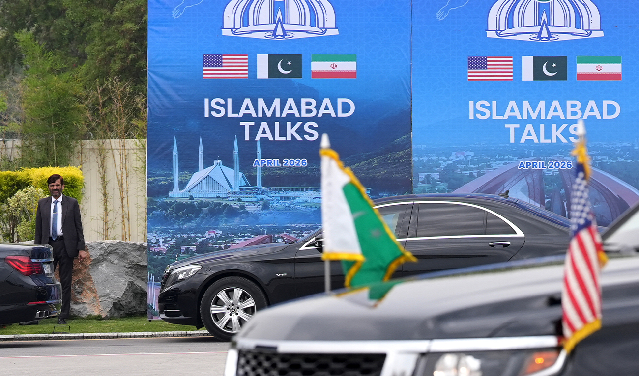 A Pakistani official is pictured during the arrival of the US Vice President JD Vance for US-Iran peace talks in Islamabad, Pakistan, on April 11, 2026. (AFP/File)