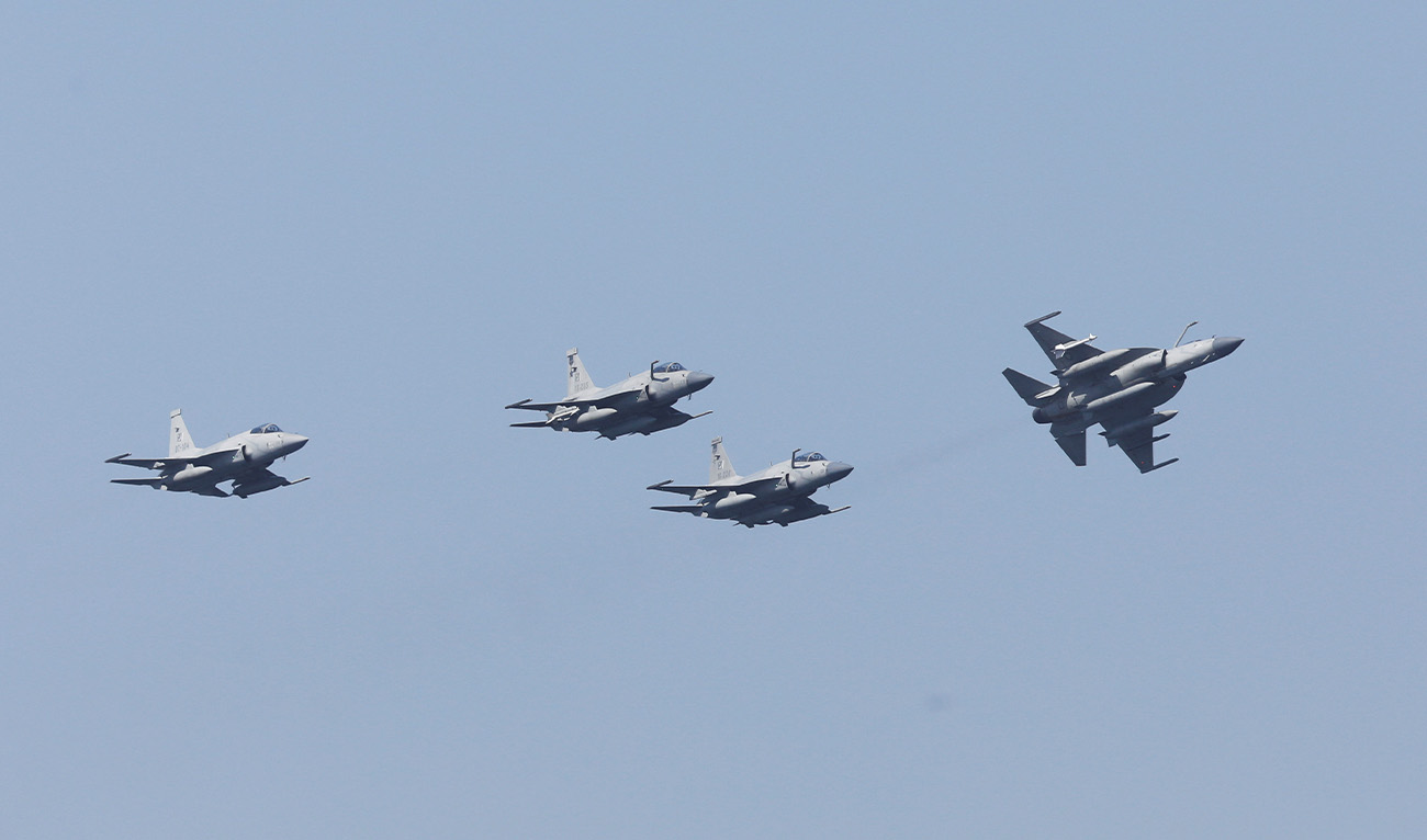 Pakistan Air Force's JF-17 Thunder jets fly past during the sea phase of Pakistan Navy's Multinational Exercise AMAN-23, in the North Arabian Sea near Karachi, Pakistan, February 13, 2023. (Reuters/File)